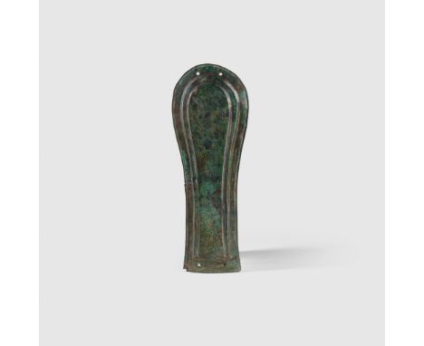 PERSIAN HORSE ARMOR NEAR EAST, EARLY 1ST MILLENIUM B.C. hammered sheet bronze, shaped in the form of a horses muzzle with a s