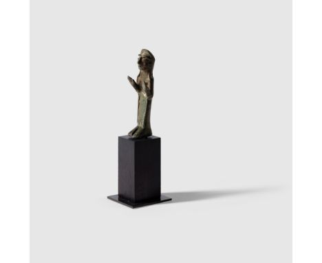 CELTIBERIAN VOTIVE FIGURE IBERIA, C. 5TH - 4TH CENTURY B.C. cast bronze, the standing female figure shown veiled and wearing 