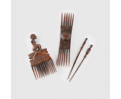 PAIR OF CHOKWE COMBS ANGOLA carved wood, comprising; a Chokwe double headed comb with central carved face; a Chokwe comb with