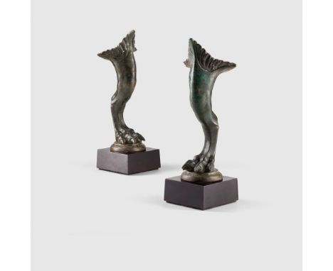 PAIR OF ROMAN FURNITURE LEGS EUROPE, C. 1ST CENTURY A.D. cast bronze, standing on a circular base, modelled in the form of gr