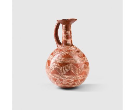 ANCIENT CYPRIOT RED WARE JUG CYPRUS, EARLY / MID BRONZE AGE, 2200 - 1800 B.C. terracotta, polished red ware, standing on a ro
