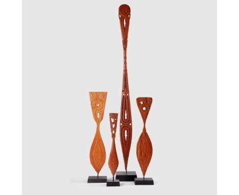 EX MUSEUM EXHIBITED COLLECTION OF SAGO STIRRERS SURINAME carved wood, the collection comprising of; one ceremonial paddle, wi