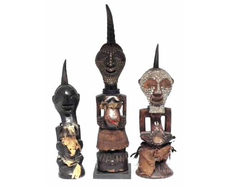 Three Songye Nkisi power figures, the tallest measures 51cm high     All lots in this Tribal and African Art Sale are sold su