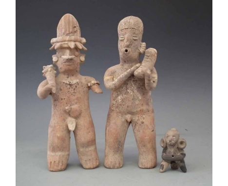 Pair of Mexican terracotta figures possibly Nayarit, also one other small pottery figure, the pair of figures measure 28cm hi