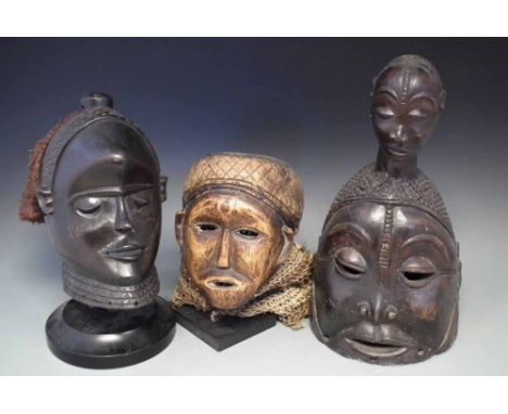 Pende mask, Chokwe mask and one other helmet mask, the largest measures 43cm high     All lots in this Tribal and African Art