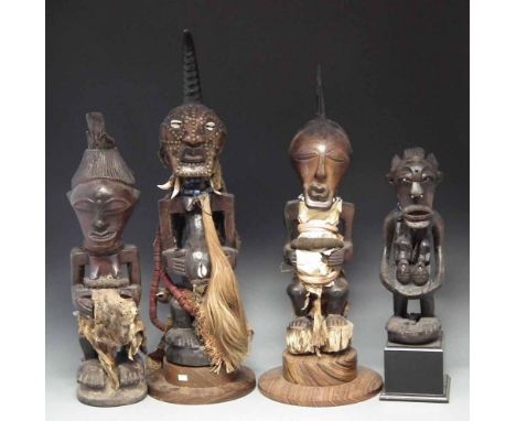 Four Songye Nkisi power figures, the tallest measures 67cm high     All lots in this Tribal and African Art Sale are sold sub