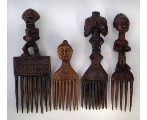 Finely carved Ivory Coast comb possibly Baule, also three other combs carved in the Songye, Luba and Hemba tribal styles, the