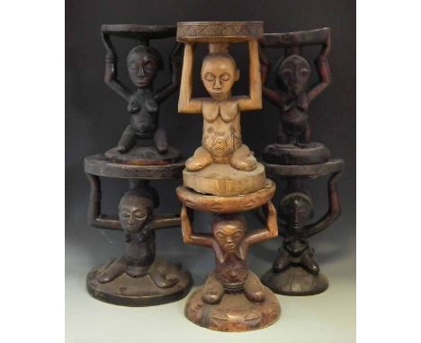 Six Luba / Hemba Caryatid stools, the largest measures 44cm high.     All lots in this Tribal and African Art Sale are sold s