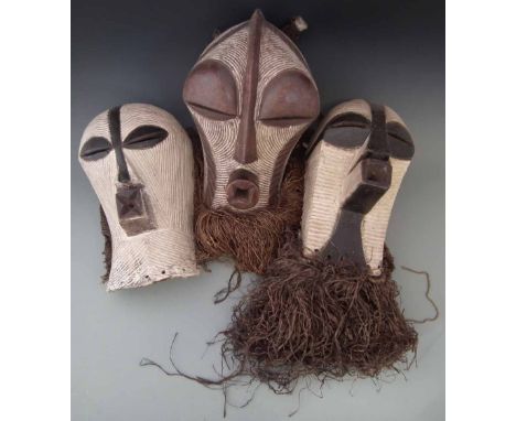 Three Songye kifwebe masks, the largest measures 42cm high.     All lots in this Tribal and African Art Sale are sold subject