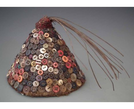 Bwami button hat, 15cm high     All lots in this Tribal and African Art Sale are sold subject to V.A.T. Therefore £100 hammer