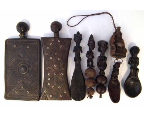 Collection of Luba, Hemba and Songye items, to include two panel boards topped with heads, two rattles, three anthropomorphic