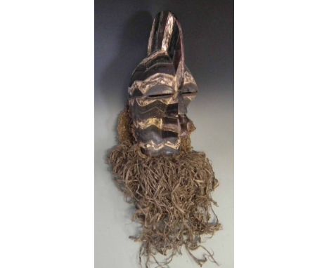 Songye Kifwebe mask  36cm high excluding beard.     All lots in this Tribal and African Art Sale are sold subject to V.A.T. T