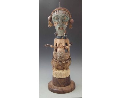 Songye Nkisi Power figure or Fetish, 75cm overall height.     All lots in this Tribal and African Art Sale are sold subject t