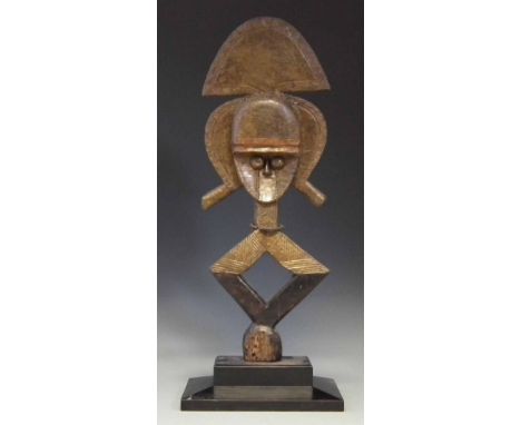 Kota reliquary figure, 55cm high     All lots in this Tribal and African Art Sale are sold subject to V.A.T. Therefore £100 h