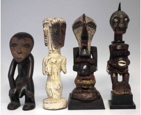 Lega janus figure, another Lega figure and two Songye figures, 31cm high     All lots in this Tribal and African Art Sale are