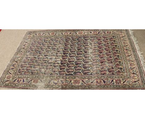 An antique Persian wool carpet decorated with gulls (AF) 125 x 177cm.