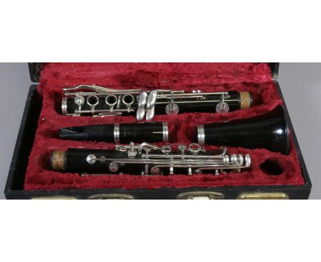 A cased clarinet by Besson of London.
