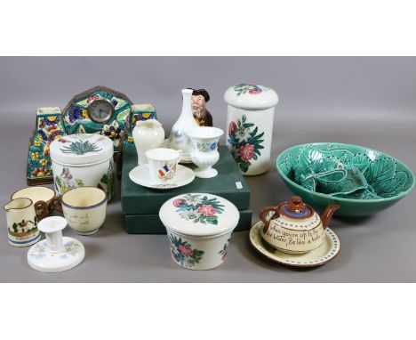A collection of pottery and china including Portmerion Botanic Gardens, Wedgwood, character jug and a pottery clock garniture
