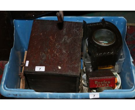 A plywood box and contents of clock glasses and a clear glass dome, along with a collection of watch and clock spares to incl