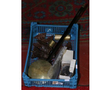 A tray containing a quantity of clock parts to include weights, pendulum, vintage brass handles etc.