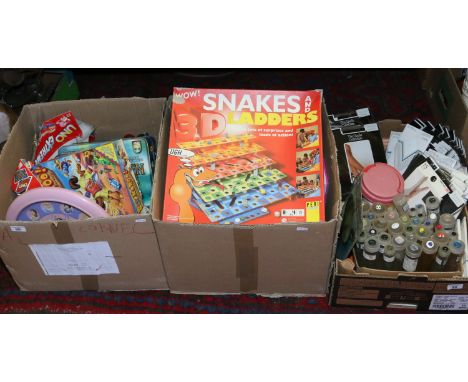 Three boxes containing childrens games and toys to include Buckaroo, Snakes and Ladders, The Golden Compass etc and vintage s