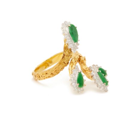 A FOUR PIECE JADE AND DIAMOND RING A 14k yellow gold band with four pieces of pear shaped jade, each surrounded by a pave dia