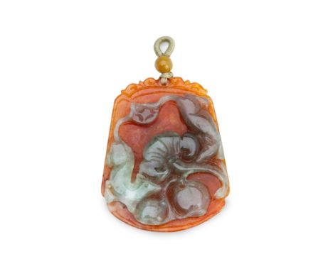 A CARVED HARDSTONE PENDANT
A pendant with carved jade floral and animalistic ornamentation.
67 mm long
18 g