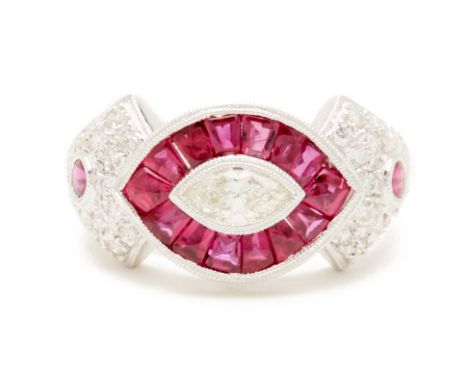 A PLATINUM, RUBY AND DIAMOND RING
A platinum ring set with a central marquise diamond and tapered baguette ruby surround, fla