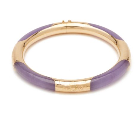 A LAVENDER STONE BANGLE
A 14k yellow gold band with curved lavender stone sections, hinged
Diameter 7cm
23 g