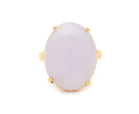 A LAVENDER JADE RING An 14k yellow gold band with a pierced figure of 8 gallery  Marked 585 Hong Kong size 14 - 15 7.76g