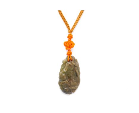 A CARVED JADE FLORAL PENDANT A carved jade floral pendant with foliate ornamentation
 3.3cm 8g