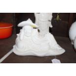 A Chinese blanc de chine figure depicting sleeping