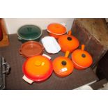 A Le Creuset saucepan, a Le Creuset casserole dish