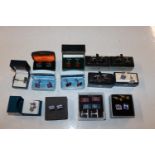 A box containing various pairs of cuff-links