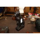 A bronze effect figure of a Egyptian cat
