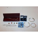 A box containing various costume jewellery to incl