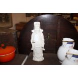 A Chinese blanc de chine standing figure possibly