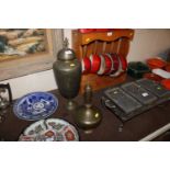 A large Oriental engraved brass baluster vase and