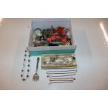 A box containing various costume jewellery to incl