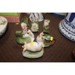Six continental porcelain novelty pig groups