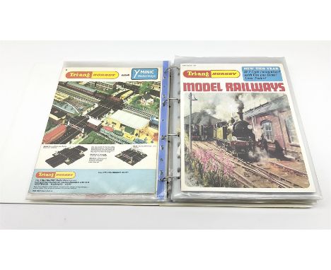 Modern loose leaf binder containing sixteen 1960s/1970s model railway catalogues including almost complete run of Tri-ang/Tri