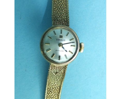 Tissot, a ladies 'Stylist' 9ct gold wrist watch on gold mesh bracelet, total weight 16.5g, boxed.