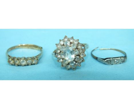 Two 9ct gold rings set white synthetic stones, size Q and a small ring set diamonds, (a/f), 6.4g, (2).