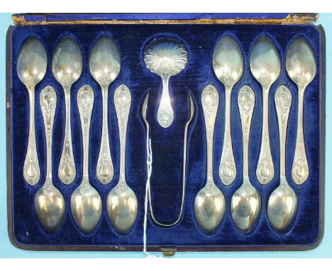 A cased set of twelve silver teaspoons, sugar tongs, Sheffield 1873 and similar caddy spoon with shell-shaped bowl, Sheffield