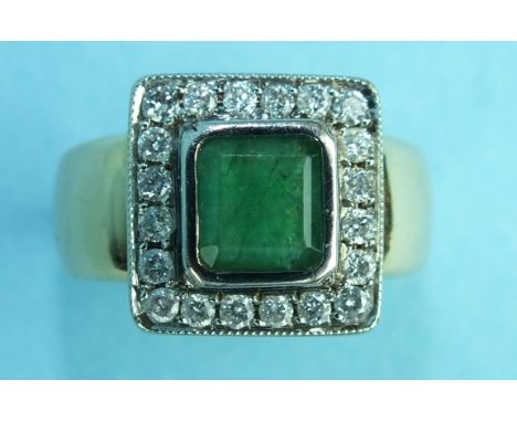 An emerald and diamond cluster ring, the central emerald of approximately 1.5cts within a surround of eighteen brilliant cut 