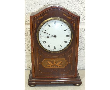 A late-Victorian inlaid mahogany mantel clock with circular enamel dial and key-wind drum movement, 13cm high and a walnut ar