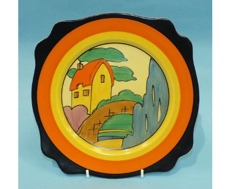 A Clarice Cliff shaped-rim plate decorated with the orange roofed cottage design, 25cm diameter.