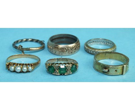 A 19th century buckle ring, size P, 3.4g, a Victorian ring claw-set four pearls, (one setting vacant), size L and four other 