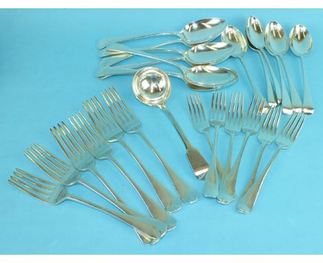 A harlequin set of silver Old English flatware, including six table forks, six tablespoons, six dessert forks, six dessert sp