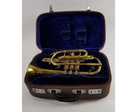 A vintage "Hsinghai" trumpet, cased